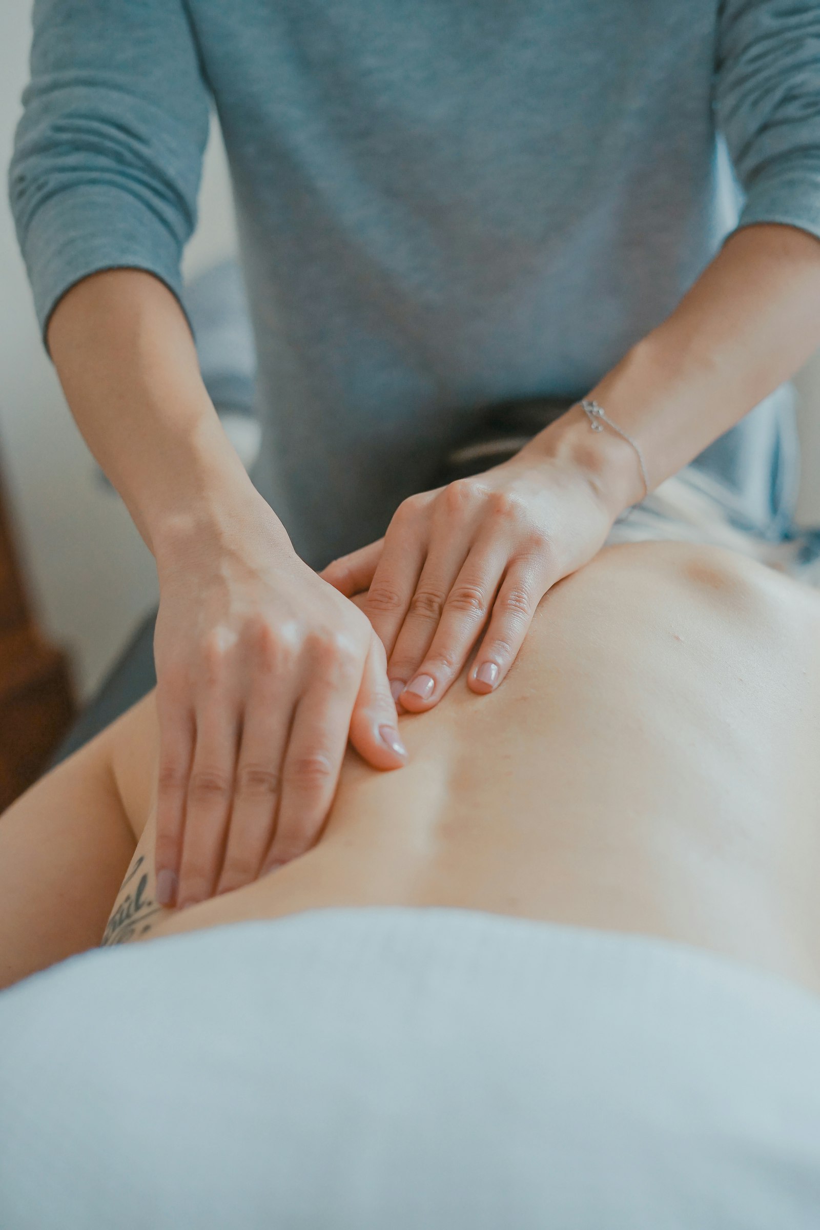 Professional body treatment in a calm salon room
